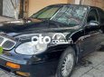 Cần bán gấp Daewoo Leganza sản xuất năm 2002, màu đen, xe nhập, 87tr