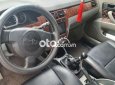 Cần tiền bán gấp xe Deawoo Lacetti EX 2009 số sàn