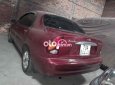 Daewoo Lanos 2004 đỏ qua sử dụng