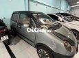 Xe Matiz che nắng che mưa mùa bão