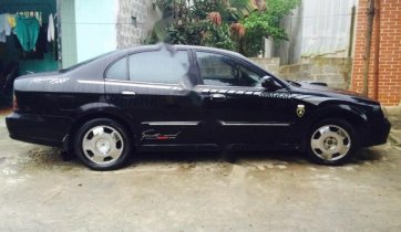 Bán xe Daewoo Magnus 2004, màu đen 