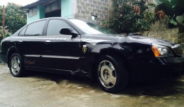 Bán xe Daewoo Magnus đời 2004, màu đen số tự động, giá tốt