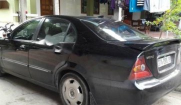 Bán Daewoo Magnus 2.5AT đời 2004, màu đen, xe nhập giá cạnh tranh