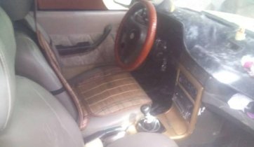 Cần bán xe Daewoo Cielo đời 1996, màu trắng xe gia đình