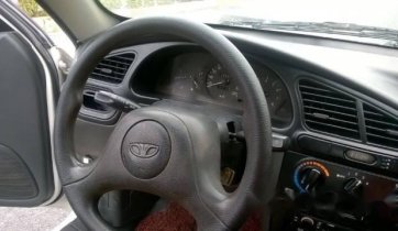 Cần bán lại xe Daewoo Lanos MT đời 2003, giá chỉ 77 triệu