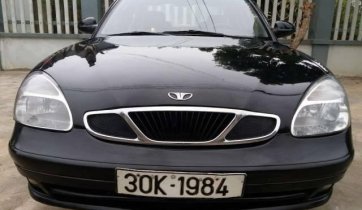 Cần bán lại xe Daewoo Nubira 1.6MT đời 2002, màu đen