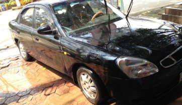 Cần bán Daewoo Nubira 2002, màu đen, nhập khẩu nguyên chiếc