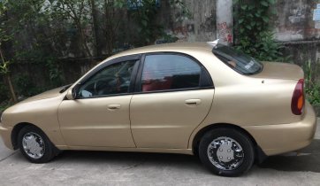 Cần bán xe Daewoo Lanos SX năm 2003, màu vàng, nhập khẩu nguyên chiếc