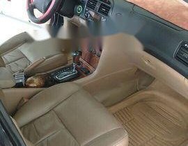 Cần bán Daewoo Magnus sản xuất năm 2004, màu đen, giá 160tr