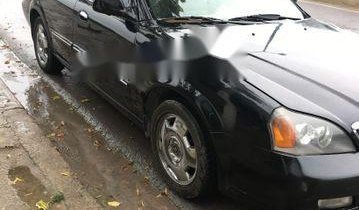 Cần bán gấp Daewoo Magnus đời 2004, màu đen, giá chỉ 145 triệu