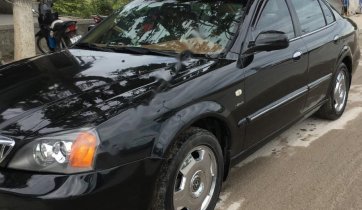 Cần bán xe Daewoo Magnus 2.5 AT đời 2004, màu đen
