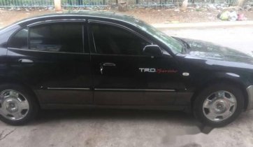 Bán ô tô Daewoo Magnus năm 2004, màu đen  