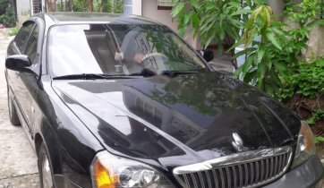 Bán Daewoo Magnus 2.5 năm sản xuất 2004, màu đen 