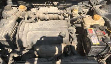 Cần bán Daewoo Nubira 1.6 MT 2002, màu đen, 88tr