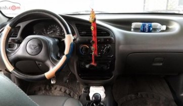 Cần bán Daewoo Lanos SX sản xuất 2005, màu trắng xe gia đình giá cạnh tranh