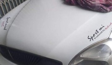 Bán xe Daewoo Nubira sản xuất 2002, màu trắng, nhập khẩu nguyên chiếc xe gia đình