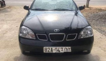 Cần bán xe Daewoo Lacetti MT đời 2004, màu đen, giá tốt