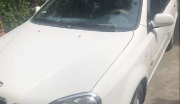 Bán ô tô Daewoo Lacetti MT sản xuất năm 2004, màu trắng, nội thất zin nguyên bản