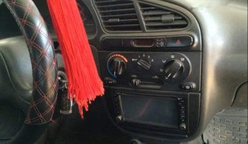 Cần bán gấp Daewoo Lanos năm sản xuất 2003, màu trắng, côn số ngọt ngào