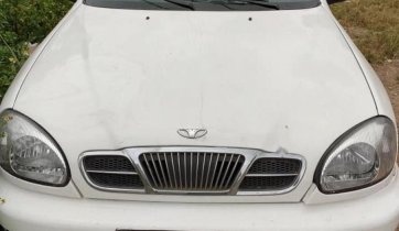 Cần bán gấp Daewoo Lanos đời 2000, màu trắng