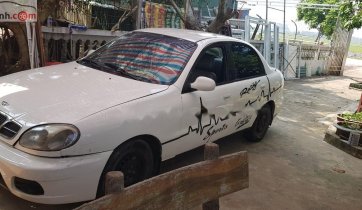 Cần bán xe Daewoo Lanos đời 2002, màu trắng, xe nhập chính hãng