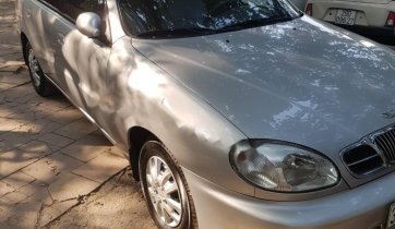 Cần bán xe Daewoo Lanos SX sản xuất 2004, màu bạc chính chủ giá cạnh tranh