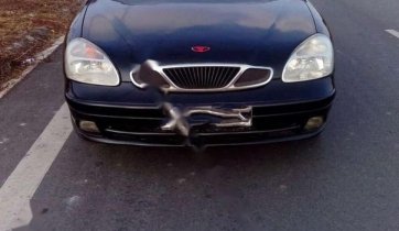 Cần bán gấp Daewoo Nubira II 1.6 đời 2003, màu đen, xe nhập