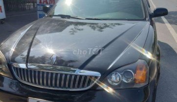 Cần bán gấp Daewoo Magnus đời 2004, màu đen, 132tr