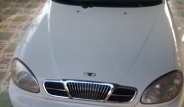 Xe Daewoo Lanos SX đời 2004, màu trắng