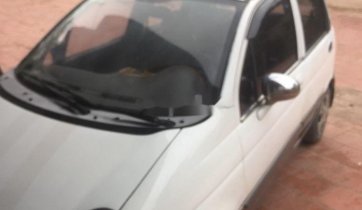 Cần bán Daewoo Matiz MT sản xuất năm 2004, màu trắng, 58 triệu