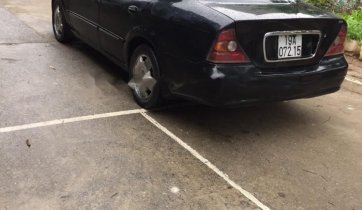 Cần bán Daewoo Magnus 2.5 AT sản xuất năm 2004, màu đen số tự động
