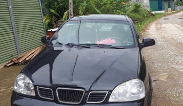 Cần bán gấp Daewoo Lacetti sản xuất 2005, màu đen, 138tr