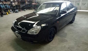 Cần bán Daewoo Nubira đời 2003, màu đen, nhập khẩu nguyên chiếc xe gia đình giá cạnh tranh