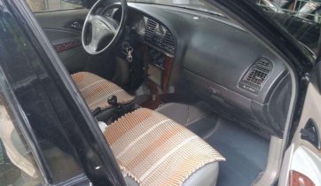 Bán Daewoo Nubira 1.6MT năm sản xuất 2002, màu đen, nhập khẩu nguyên chiếc, giá chỉ 60 triệu
