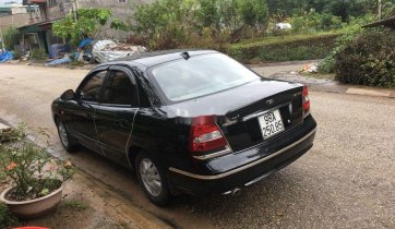 Bán Daewoo Nubira đời 2003, màu đen, số tự động, 75 triệu