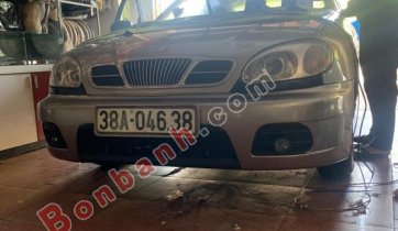 Bán Daewoo Lanos SX sản xuất 2003, màu ghi vàng