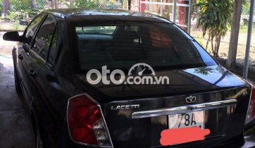 Cần bán lại xe Daewoo Lacetti 1.6 MT năm 2011, màu đen, nhập khẩu nguyên chiếc như mới