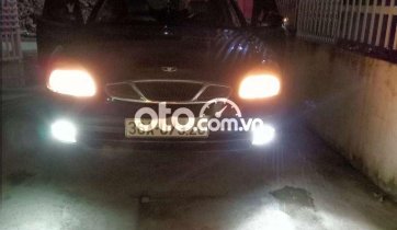 Cần bán gấp Daewoo Nubira sản xuất năm 2004, màu đen, nhập khẩu nguyên chiếc  