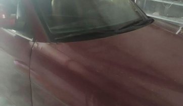Cần bán gấp Daewoo Nubira đời 2000, màu đỏ