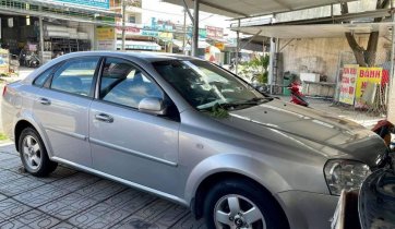 Cần bán lại xe Daewoo Lacetti EX đời 2010, màu bạc còn mới 