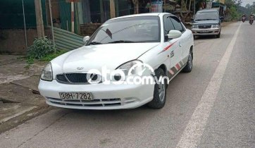 Cần bán gấp Daewoo Nubira sản xuất 2003, màu trắng xe gia đình giá cạnh tranh