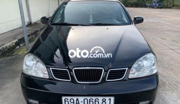 Xe Daewoo Lacetti năm sản xuất 2005, màu đen còn mới, giá chỉ 140 triệu