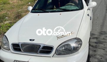 Cần bán gấp Daewoo Lanos sản xuất năm 2001, màu trắng, nhập khẩu nguyên chiếc