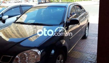 Cần bán gấp Daewoo Lacetti MT đời 2005, màu đen, giá chỉ 125 triệu