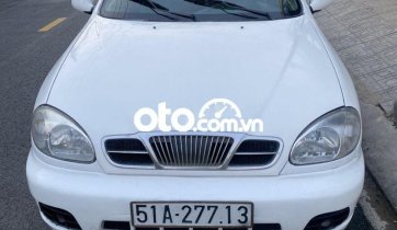Cần bán Daewoo Lanos MT đời 2003, màu trắng, nhập khẩu nguyên chiếc chính chủ