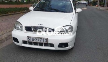 Cần bán gấp Daewoo Lanos MT năm 2003, màu trắng, nhập khẩu nguyên chiếc, giá chỉ 80 triệu