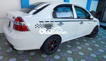 Cần bán lại xe Daewoo Gentra MT đời 2009, màu trắng xe gia đình