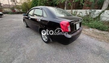 Cần bán Daewoo Lacetti EX năm sản xuất 2010, màu đen