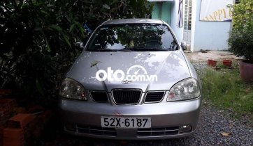 Bán xe Daewoo Lacetti MT năm sản xuất 2004, màu bạc