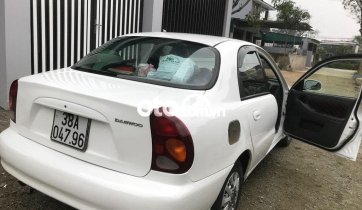 Cần bán gấp Daewoo Lanos sản xuất năm 2002, màu trắng, xe nhập